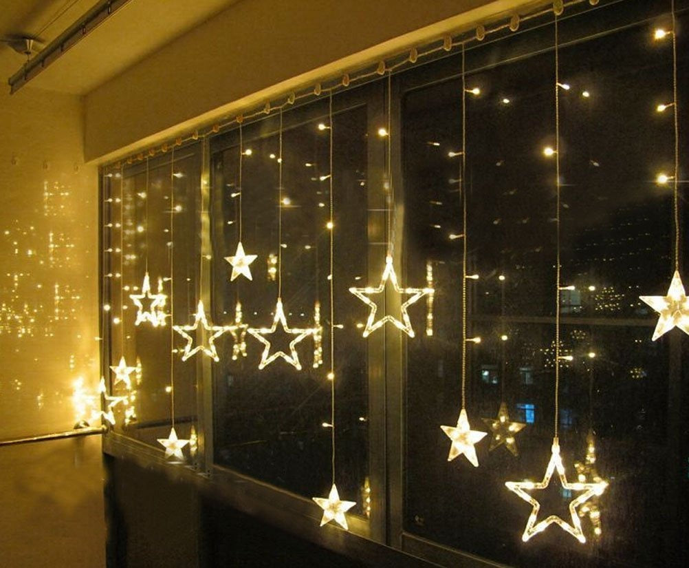 LED Sterrengordijn kerst - 12 sterren - warm wit - 138 leds - Koppelbaar