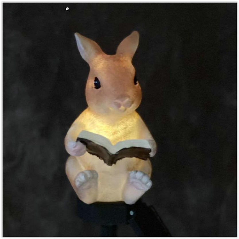 Solar LED Konijn met boek - Met schemersensor en prikpen